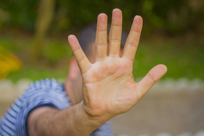 Man showing stop gesture