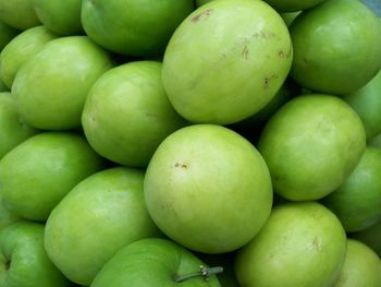 Full frame shot of green apples for sale at market