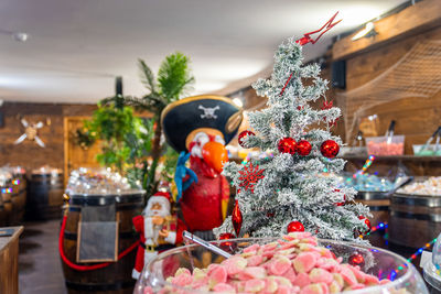 Gingerbreads, candies and nuts displayed on a christmas market