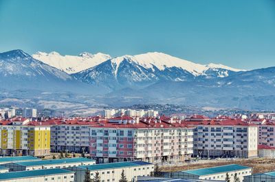 View of cityscape with mountain range in background