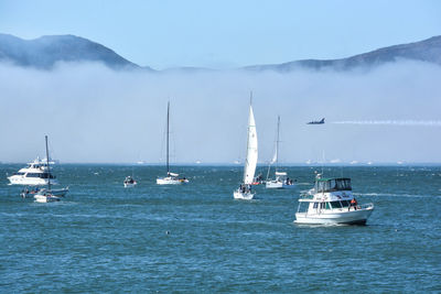 Sailboat sailing in sea