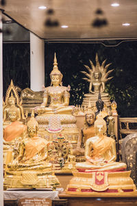 Buddha statue in illuminated building