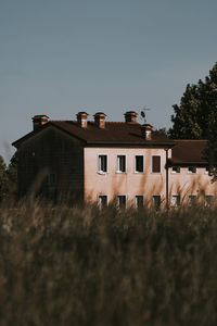 Low angle view of buildings against clear sky