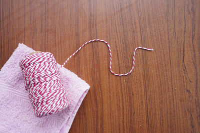 Directly above shot of pink petals on table