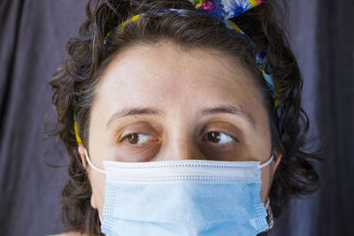 Portrait of young woman with face mask