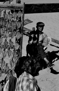 Portrait of man sitting outdoors