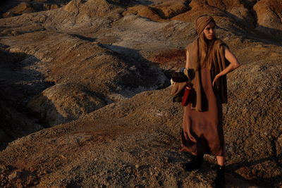 Woman standing on rock