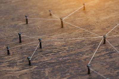 High angle view of barbed wire on table