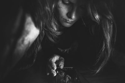 Close-up portrait of a smiling young woman