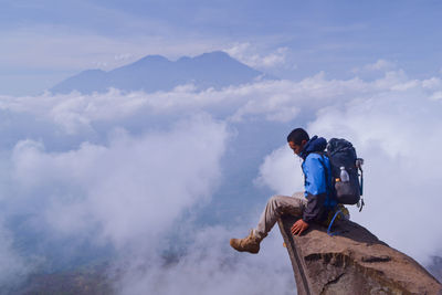 Full length of man on mountain against sky