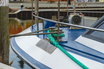 Close-up of rope tied on metal railing