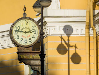 Close-up of clock on wall