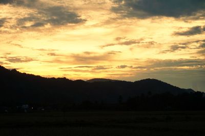 Scenic view of silhouette landscape against sky during sunset