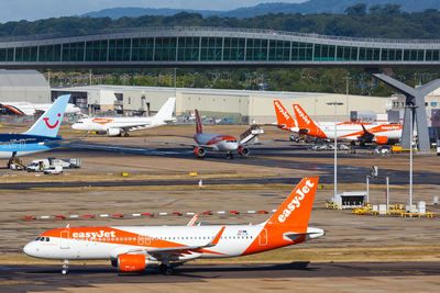 High angle view of airplane on airport runway