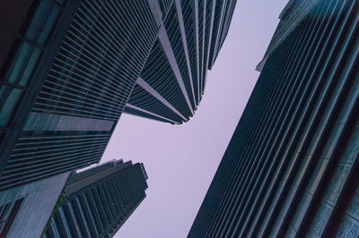 Low angle view of skyscrapers against clear sky