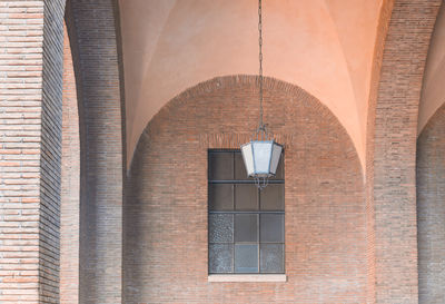 Low angle view of window on building wall