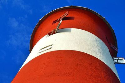 Low angle view of built structure against blue sky