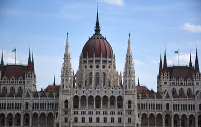 Buildings in city against sky