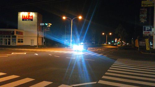 Illuminated street at night