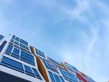 Low angle view of building against blue sky