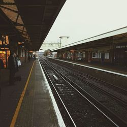 Railroad station platform against sky