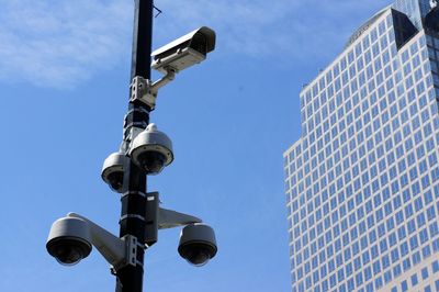 Low angle view cams against sky