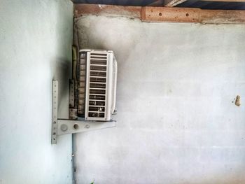 Close-up of window on wall of old building