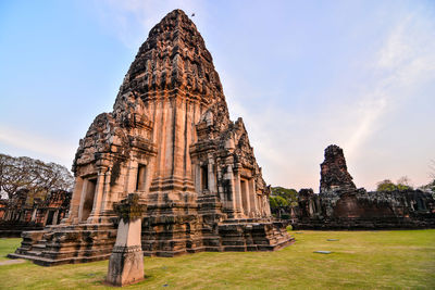 Old temple building against sky