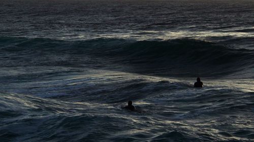 People on sea shore