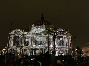 Tourists at night