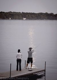 Full length of woman standing in water