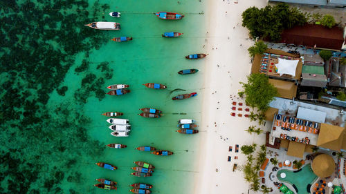 Directly above shot of boats moored on beach