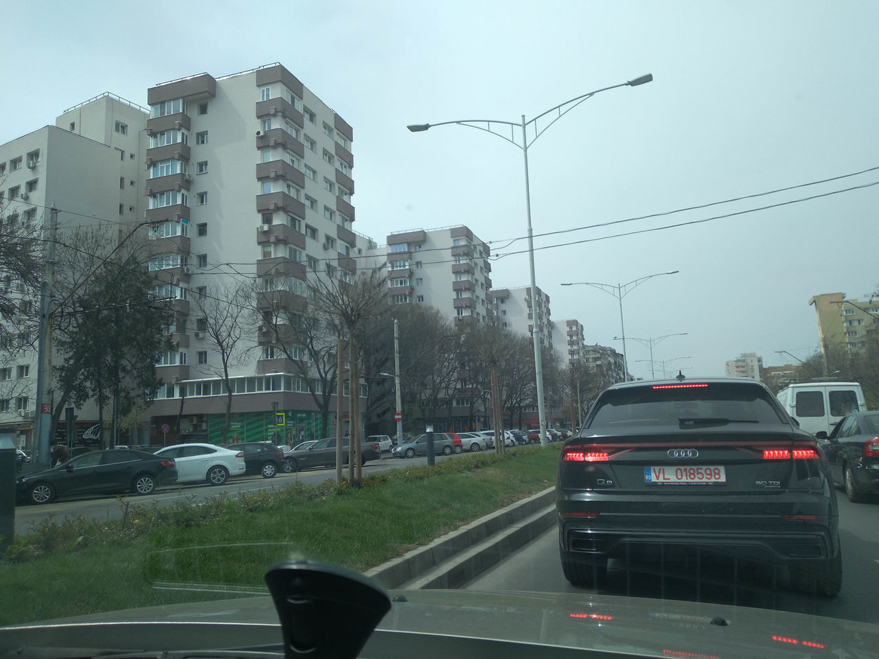 CARS ON STREET IN CITY