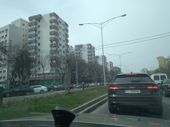 Cars on road in city