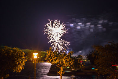 Firework display at night