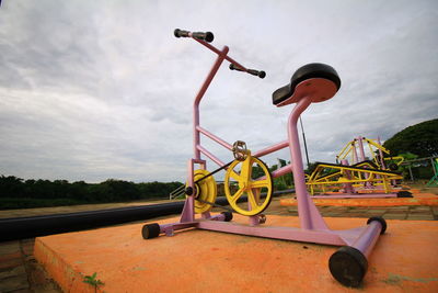 View of playground in park against sky