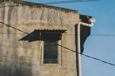 Low angle view of old building against sky