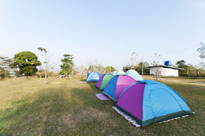 Colorful umbrellas against clear sky