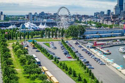 High angle view of ferris wheel in city