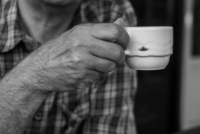 Close-up of man holding ice cream