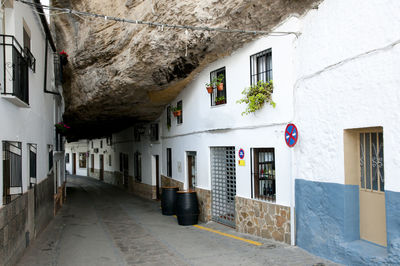 Alley amidst buildings in city