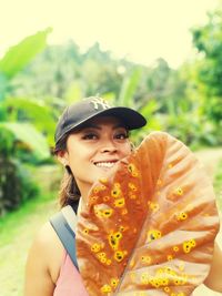 Portrait of a smiling young woman