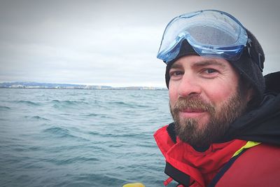 Portrait of young man in water