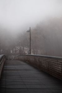 Bridge against sky during foggy weather