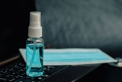 Close-up of water bottle on table