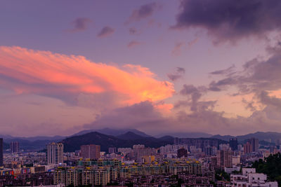 High angle view of buildings against sky during sunset