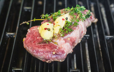 Close-up of meat on barbecue grill