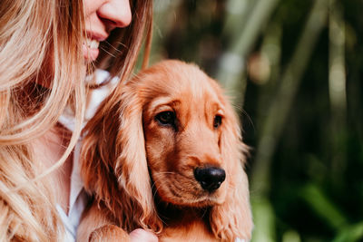 Woman with dog at park