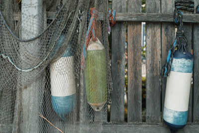 Close-up of fishing net against wall