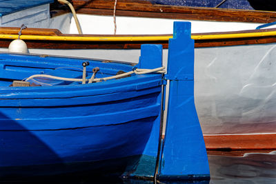 View of fishing boat moored at harbor